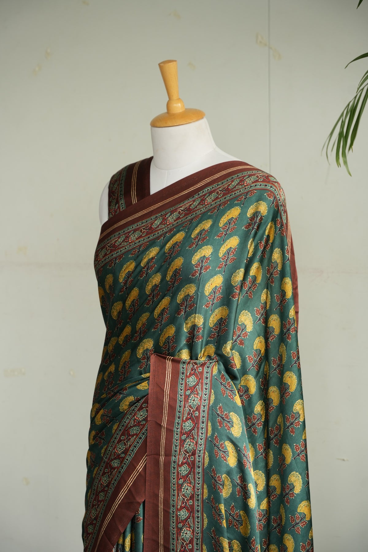 MEERA – Forest Green & Mustard Floral Modal Silk Saree